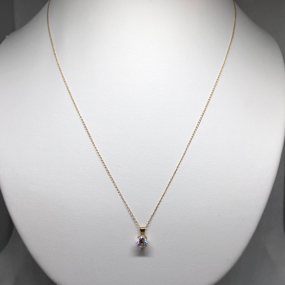 Jewelry - 14 karat gold necklace and CZ pendant
